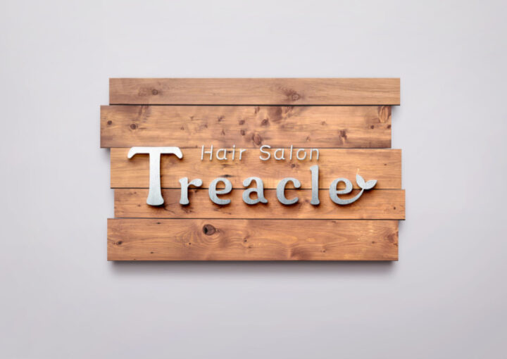 優しい風合いのヘアサロンのロゴデザイン