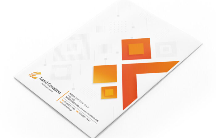 封筒制作事例 - 不動産会社の角2封筒デザイン