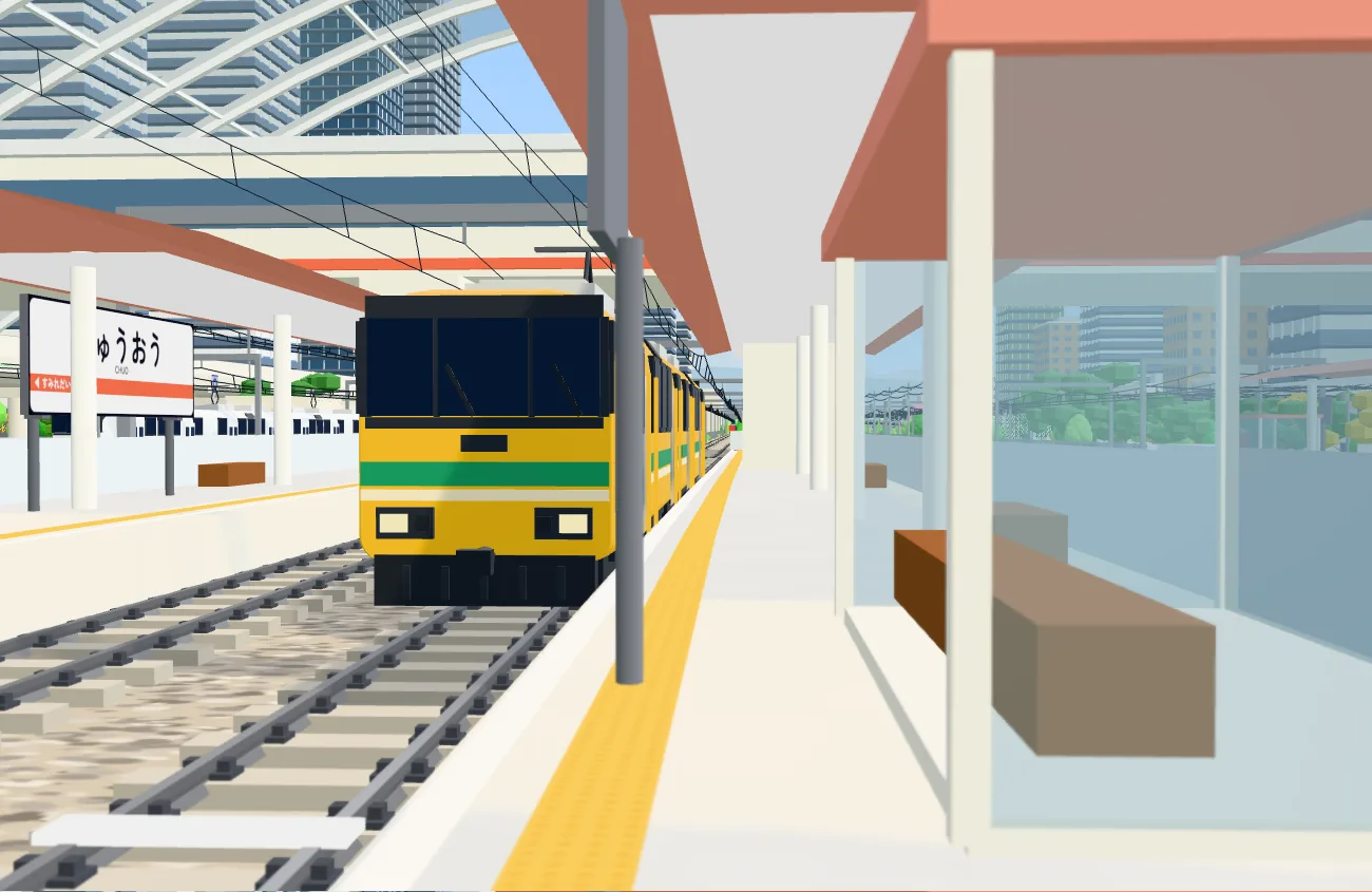 ちゅうおう駅のホームに止まる、黄色に緑の帯のローカル電車「ひだまり」