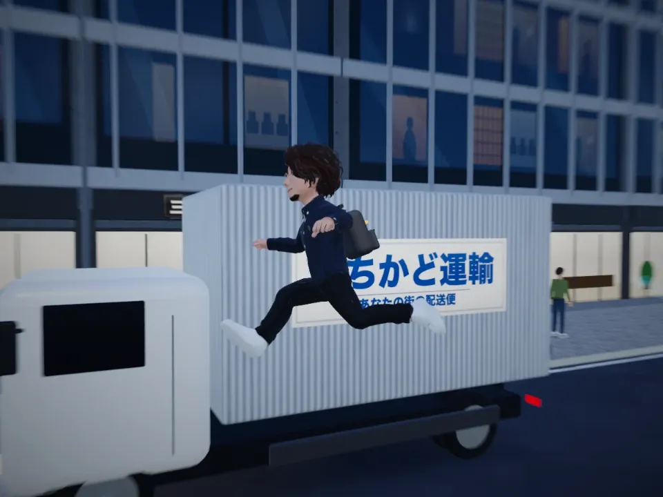昼のオフィス街で、トラックの荷台を跳び越える